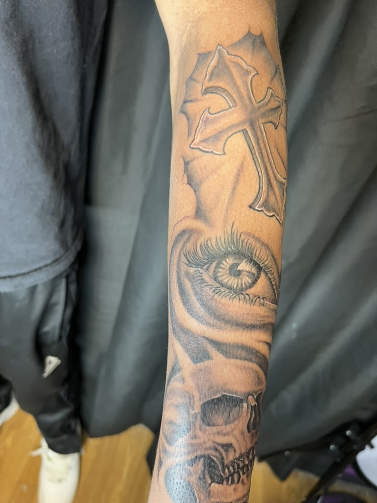 One-year healed cross eye skull inner forearm black and grey realism by Joshua Cole, Work of Art Las Vegas