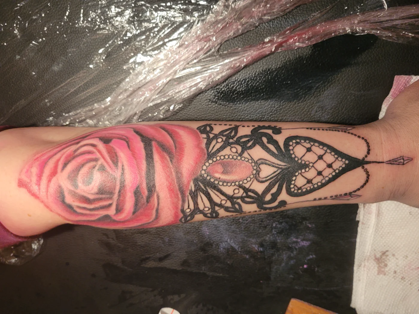 Pink rose ornamental tattoo artwork — 10 percent offer visual at Work of Art Tattoo & Piercing Las Vegas