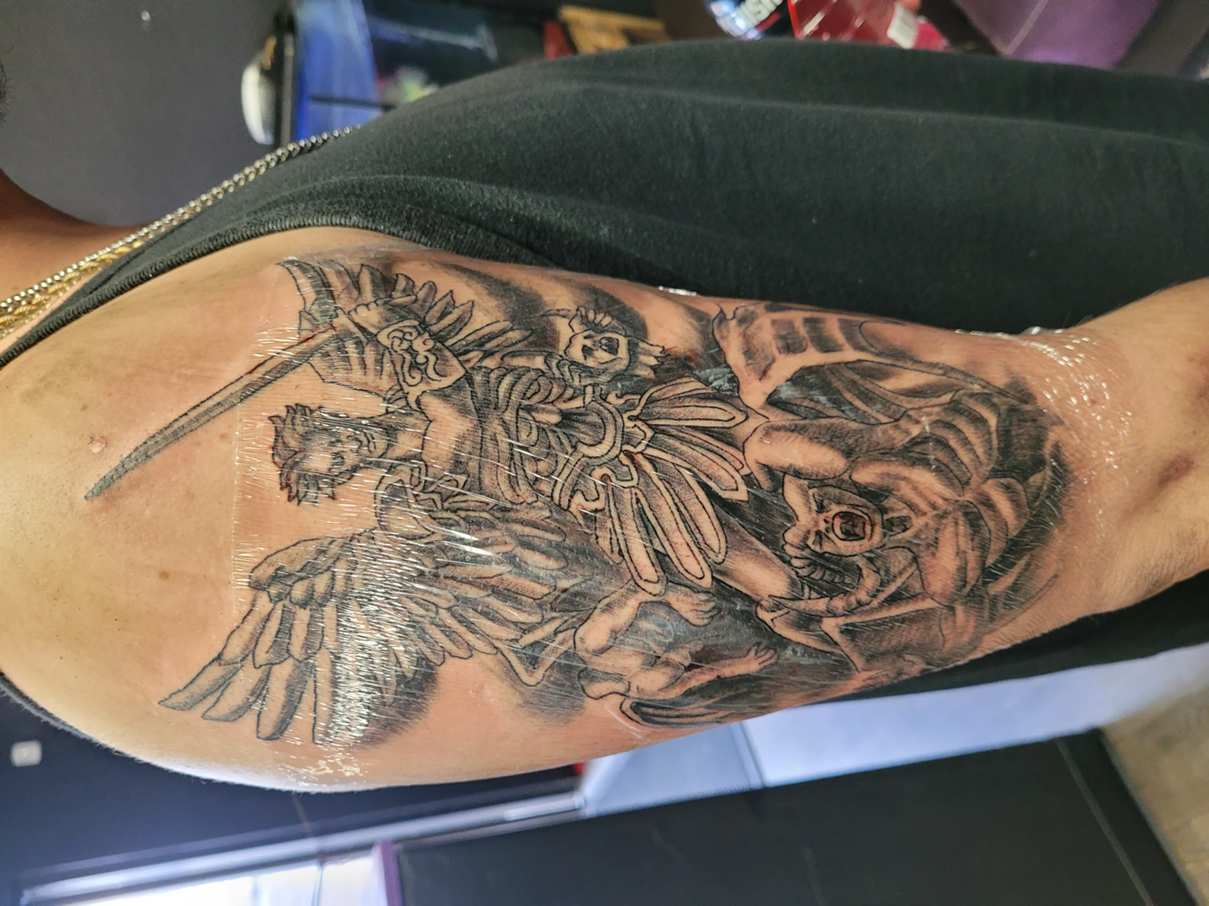 hero archangel michael demon upper arm realism — Las Vegas tattoo portfolio at Work of Art