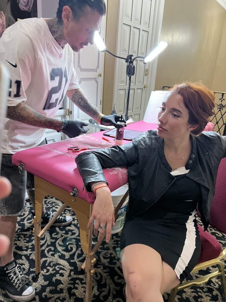 Mobile tattoo workspace with Work of Art banner — private event Las Vegas