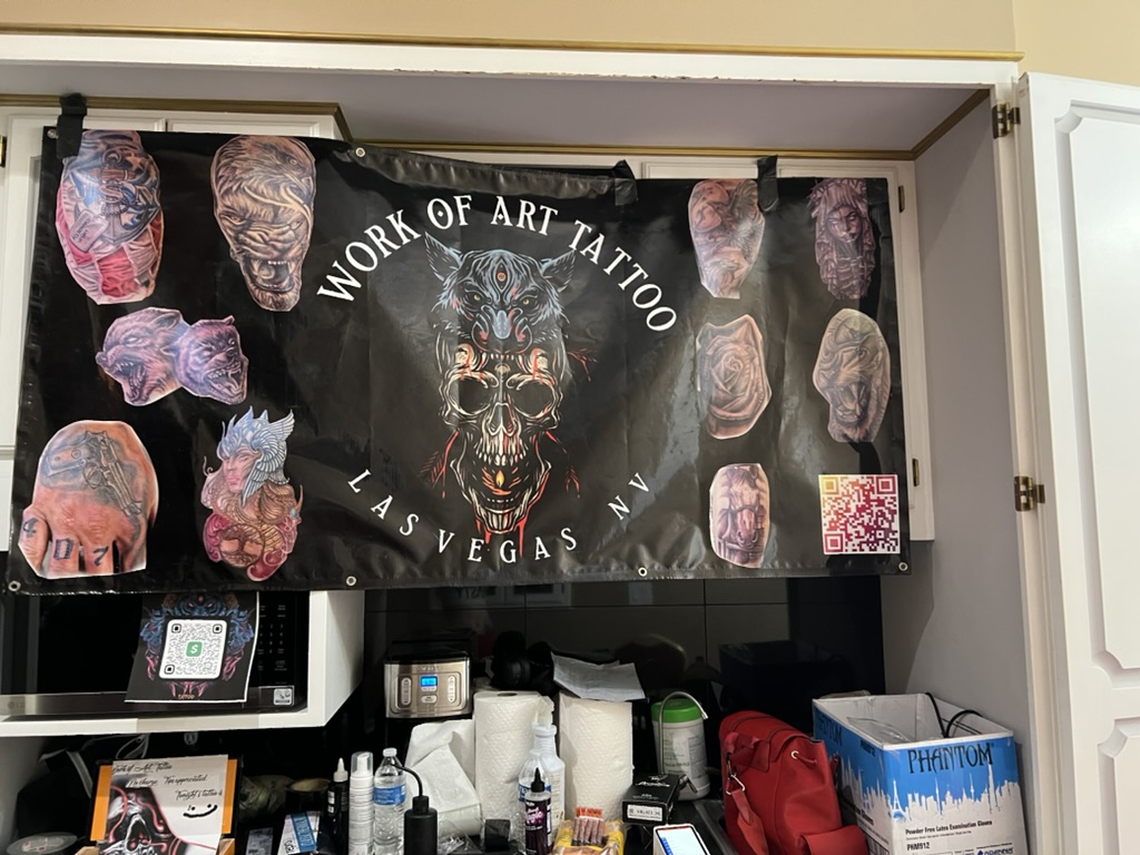 Crowded luxury event with illuminated fountain — offsite tattoo booking at Mike Tyson's house, Joshua Cole Work of Art Las Vegas
