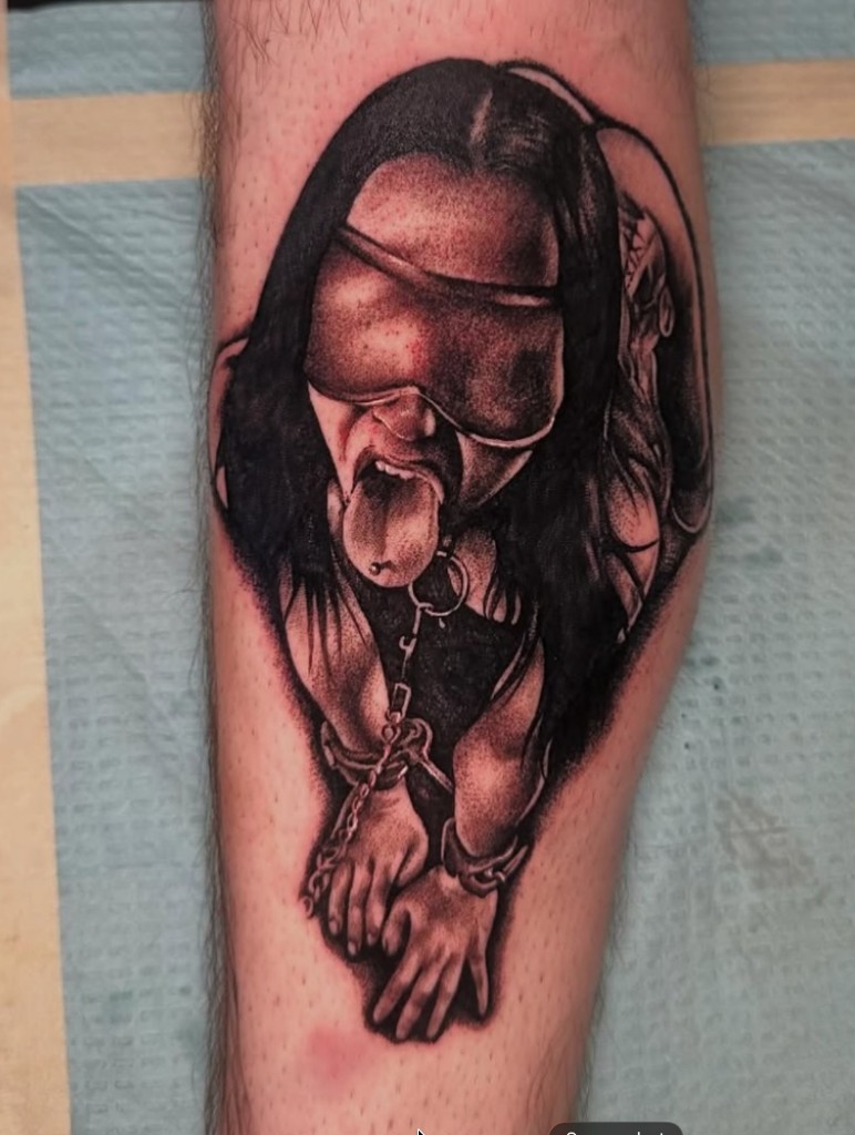 Realistic blindfolded woman with collar, chain and wrist shackles in black-grey ink — Joshua Cole, Work of Art Las Vegas