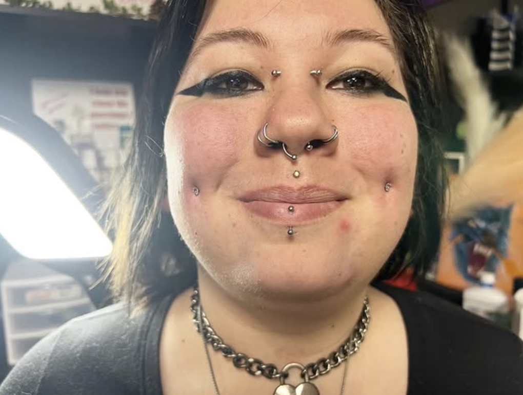Bridge, septum, nostril, philtrum and cheek piercings with silver jewelry — Joshua Cole, Work of Art Las Vegas