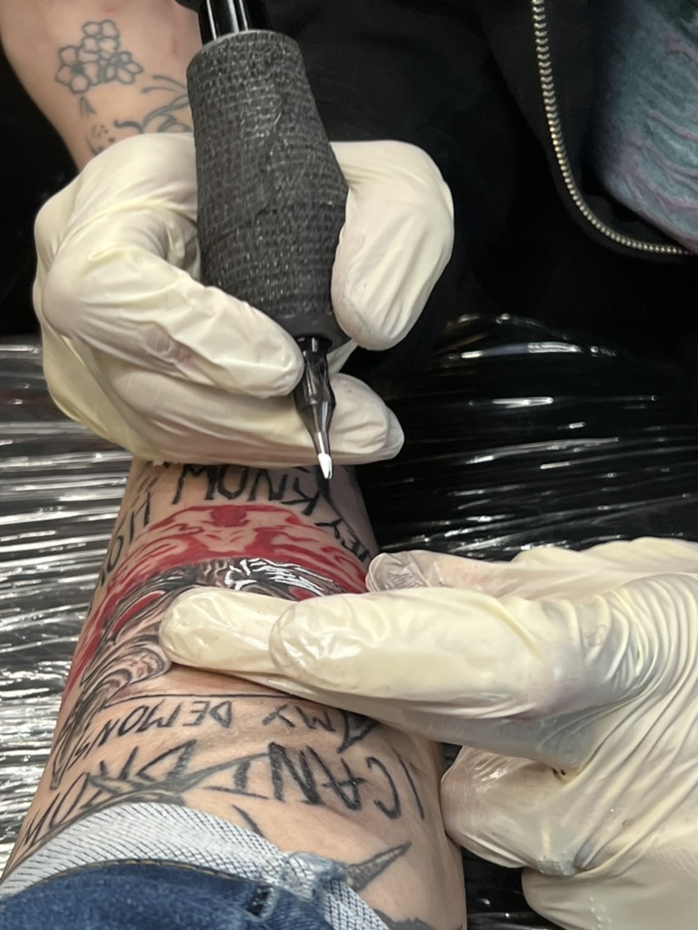 White ink detailing on illustrative demon tattoo — Joshua Cole, Work of Art Las Vegas