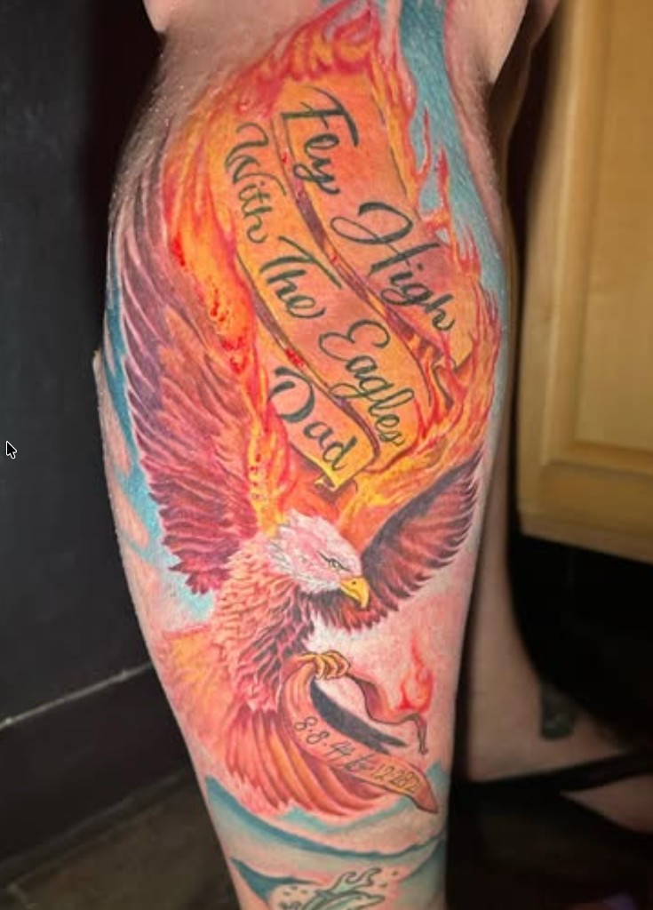 Fresh color eagle memorial tattoo on calf immediately after session — Work of Art Las Vegas